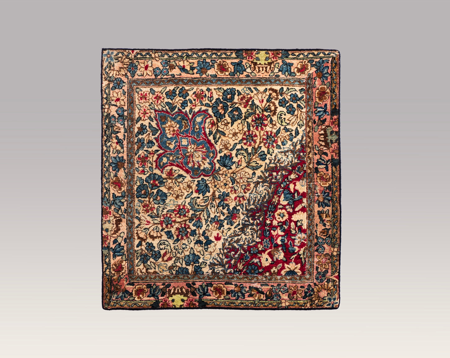 An Antique Kerman Persian Cushion