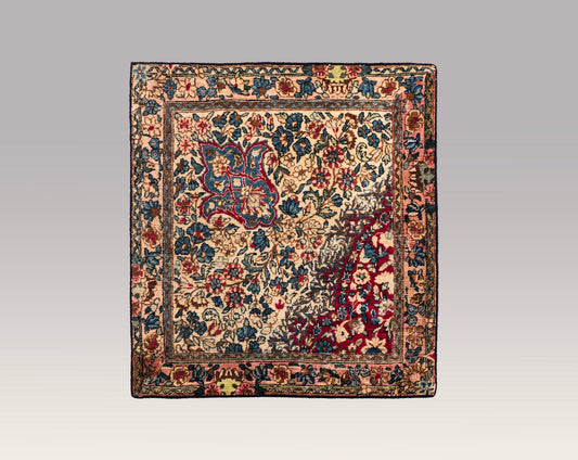 An Antique Kerman Persian Cushion