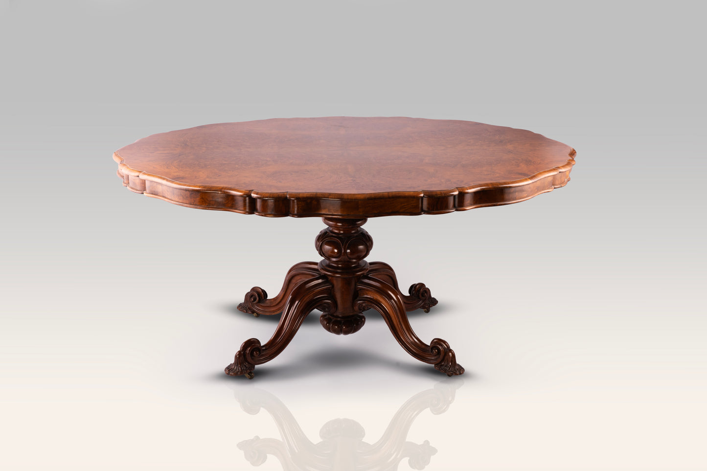 A Fine Victorian Burr Walnut Tilt Top Veneered Oval Breakfast Table