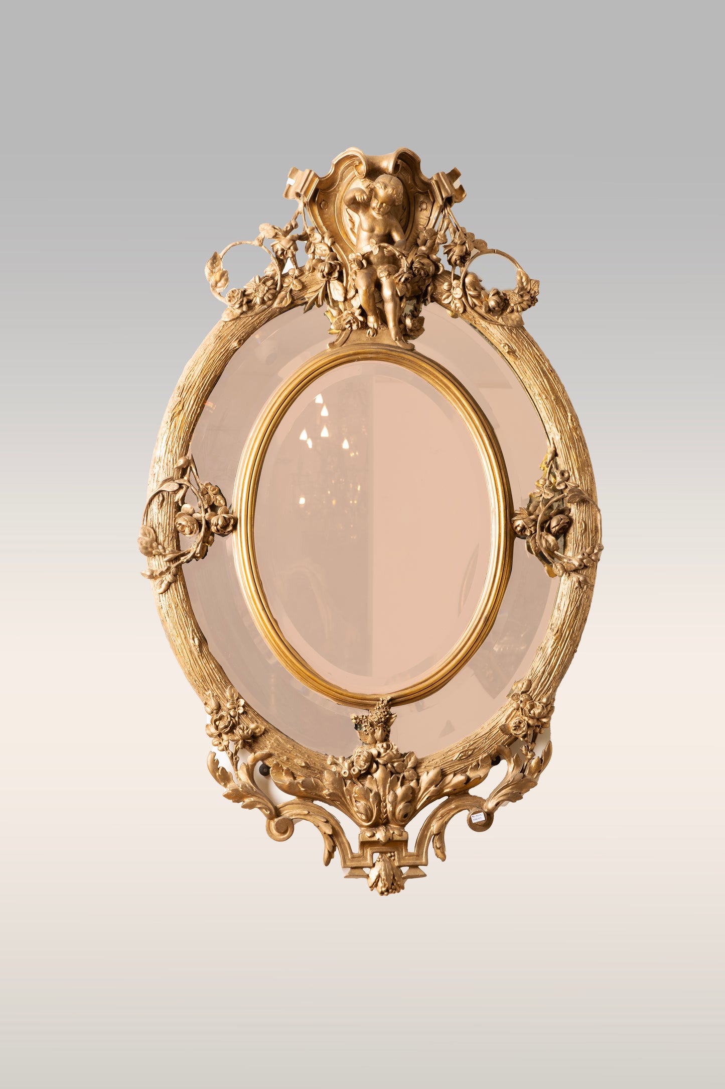 Napoleon III Carved Giltwood Oval Mirror.