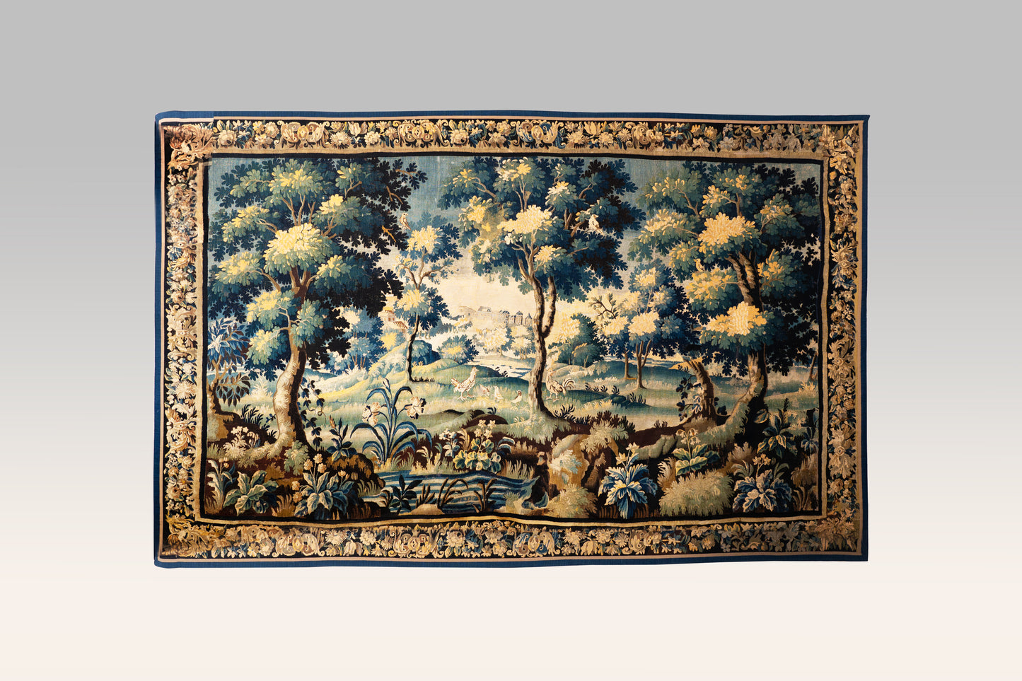A Flemish Beavais  Verdure Wool & Sillk Tapestry with Complete Original Border